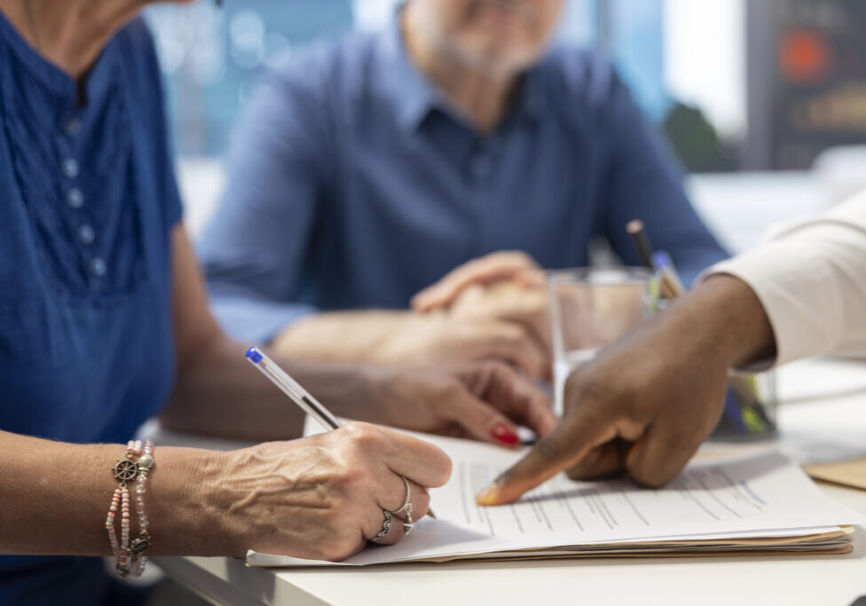 Why you should update your estate plan. Person updating estate plan with estate planning attorney. Updating revocable living trust.